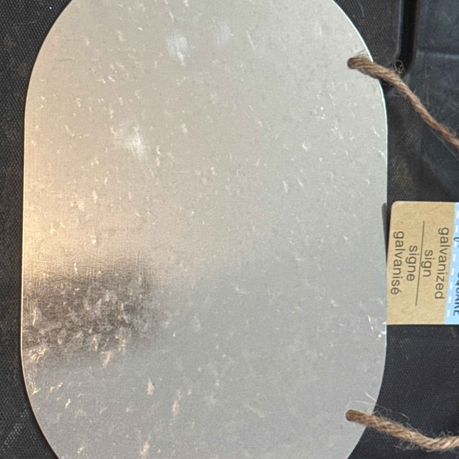 Galvanized oval sign